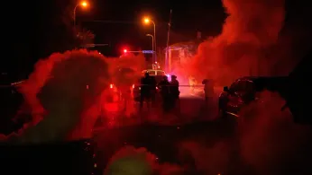 Tear Gas Floods a Minneapolis Family's SUV After They Get Caught Between Protesters and Officers